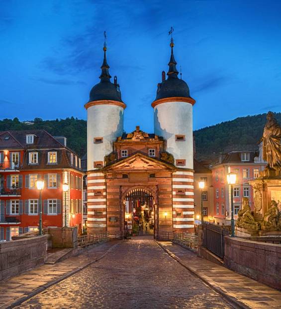 Illuminated Old Bridge Gate on Karl Theodor Bridge in Heidelberg, Baden-Wurttemberg, Germany